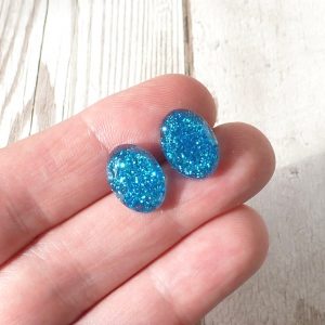 Turquoise Glitter Oval Studs on hand
