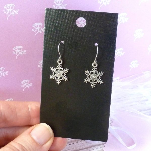 spikey snowflake earrings on card