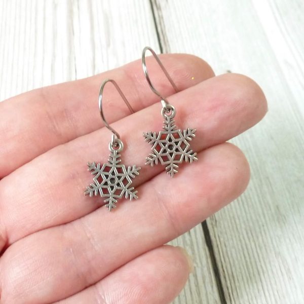 spikey snowflake earrings on hand