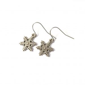 spikey snowflake earrings on white background