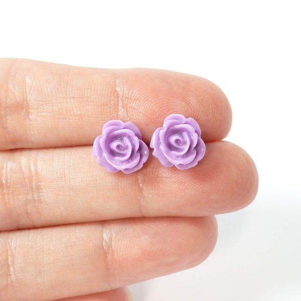 Lilac rose studs on hand