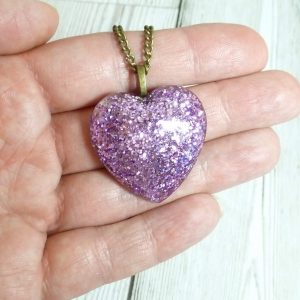 Lilac glitter large heart pendant on hand
