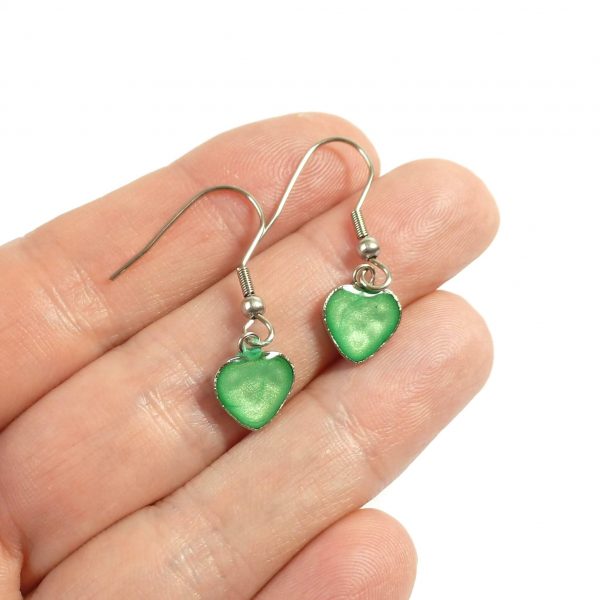 Green Steel Heart Dangle Earrings on hand