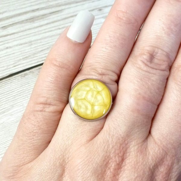 18mm Yellow Steel and Enamel Ring on hand