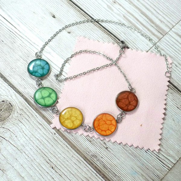 medium 5 bezel rainbow necklace on pink and wood 3