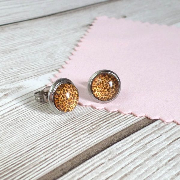 10mm bronze studs on wooded background