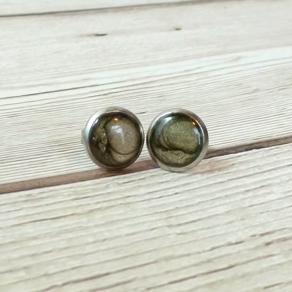 10mm onyx steel studs on wooden background