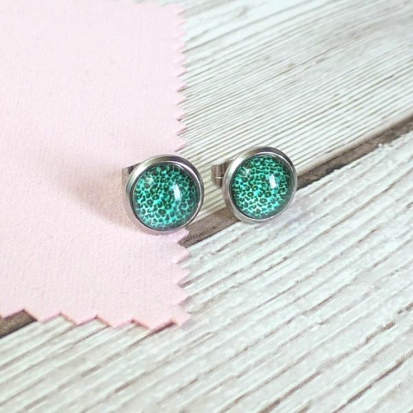 10mm sea green studs on wooden background