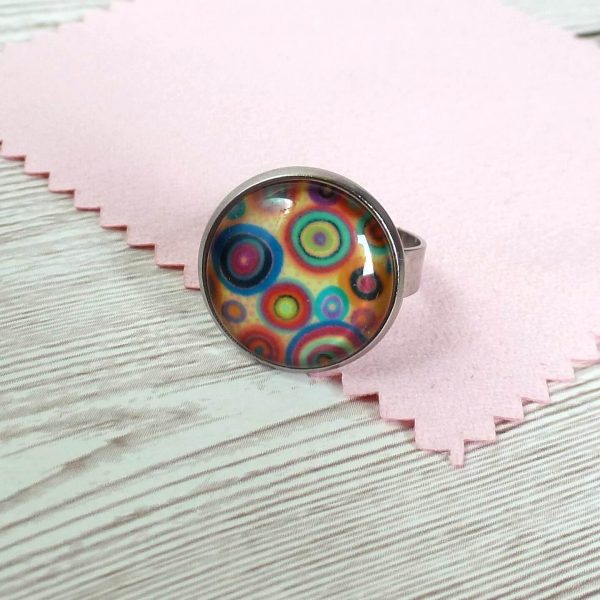 18mm ring bright circles on wooden background