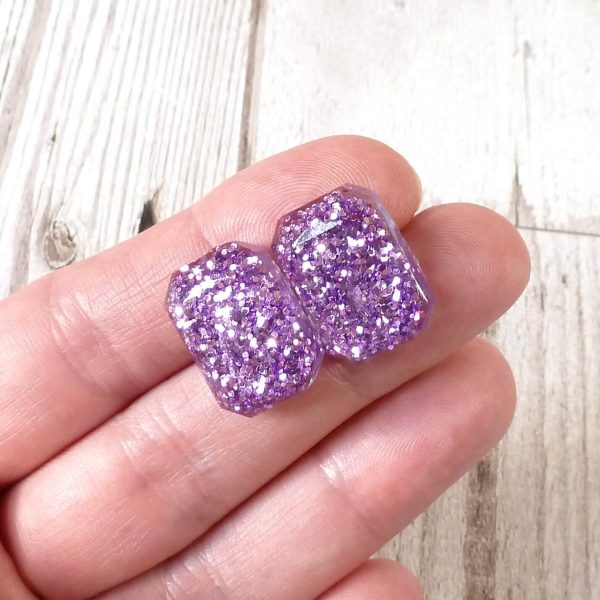lilac glitter large octagon studs on hand