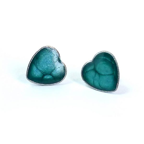 Turquoise heart studs on white