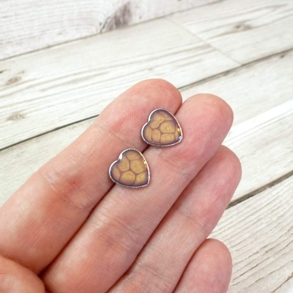 lilac gold heart studs on hand