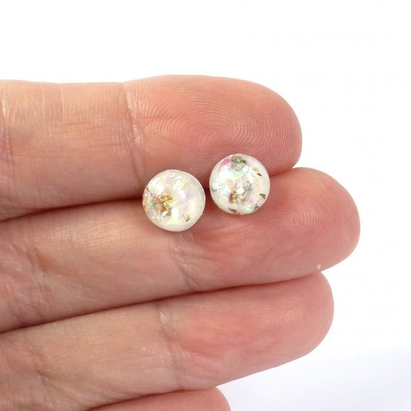 white foil filled studs on hand