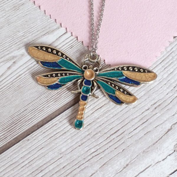 blue teal and gold dragonfly on pink view 3