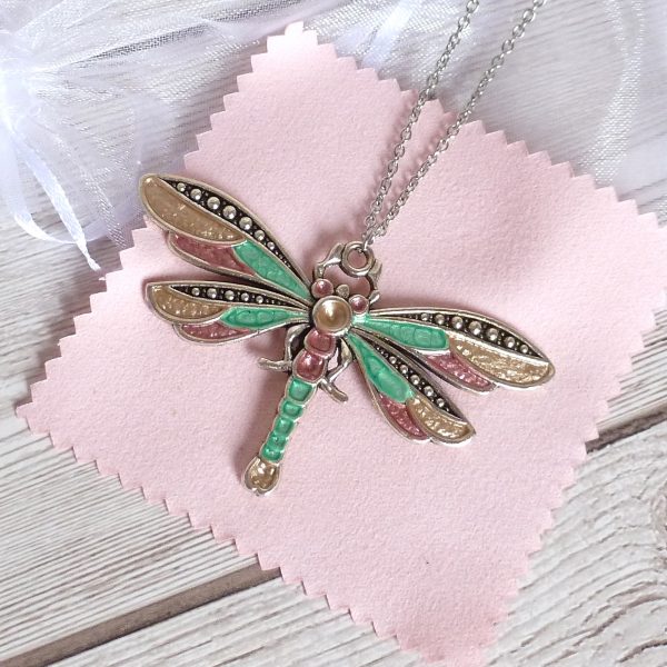 gold rose and emerald dragonfly on pink view 1